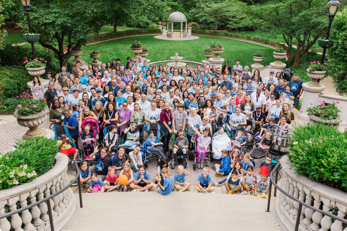 The GFPD Community Standing together outside at the GFPD Family and Scientific Conference meeting venue